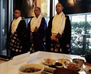 Monks from Koyasan in Wakayama Prefecture attend the opening of Koyasan Cafe, a religious and culinary event in Tokyo continuing until Sept.8 at the Shin-Marunouchi Building across from Tokyo Station. 